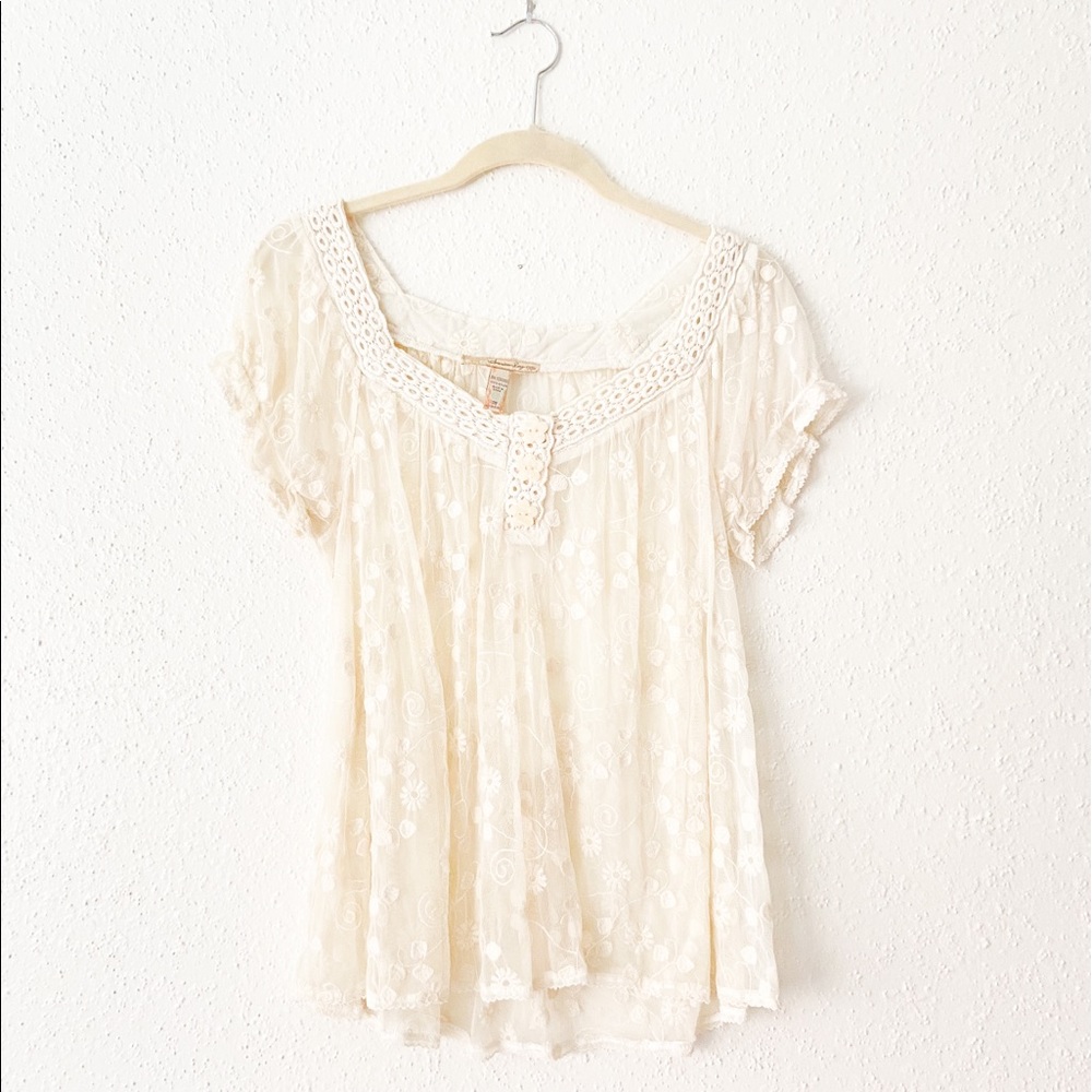 Woman’s Floral Lace Blouse